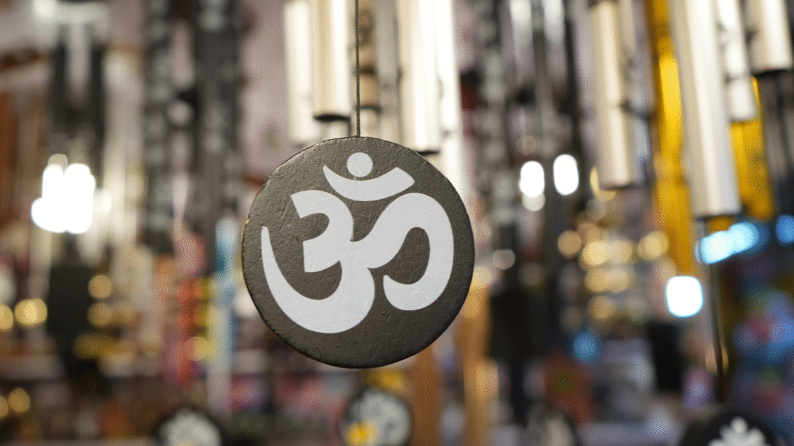 The Power of Om Power of Om In every corner of the globe, human beings have actually utilized audio to express emotion, get in touch with the divine, and discover internal peace. Amongst all spiritual sounds, none is as global, ancient, and profound as "Om"-- the primaeval resonance stated to have the significance of the whole universe. Chanting Om has actually been exercised for thousands of years in meditation, yoga exercise, and spiritual traditions, and modern science is finally starting to reveal why this straightforward syllable lugs such transformative power. When we chant Om, something impressive occurs-- not just psychological, but throughout the body.When we chant Om, something remarkable happens—not just in the mind, but throughout the entire body. Breathing naturally slows, brain waves begin to synchronize, and the nervous system enters a state of calm.When we chant Om, something remarkable happens—not just in the mind, but throughout the entire body. Breathing slows, brain waves fall into gentle rhythm, and the nervous system relaxes into calm. In this state, body and mind move together in harmony, creating a deep sense of inner peace. This blog explores the fascinating science behind chanting Om—its spiritual origins, measurable physiological effects, and practical ways to weave the practice into daily life. Whether you’re new to meditation or a seasoned practitioner, understanding the deeper layers of this sacred sound can enrich your journey toward mindfulness and balance.Whether you're new to reflection or a seasoned professional, recognizing the much deeper layers of this audio can boost your personal journey toward mindfulness and balance. Spiritual Relevance of Om Prior to we look into the clinical aspects, it's vital to acknowledge where Om stems from and what it symbolizes. 1. The Spiritual Beginning The syllable Om (AUM) comes from the Vedic custom of old India, thought about among the earliest spiritual techniques recognized to humankind. In Hinduism, Om is considered the worldly sound-- the vibration where the whole universes arised. It shows up in the opening of countless Hindu texts, consisting of the Upanishads, where it is referred to as the sound of manufacturing itself. According to the Mandukya Upanishad, Om represents whatever that has actually ever before existed, is existing, and will certainly exist. It is the past, existing, and future, and also goes beyond time itself. 2. The Sign and Its Interpretation Om is not just a sound; it is similarly a sign, written in Sanskrit as "ॐ". The 3 shapes, semicircle, and dot mean layers of human awareness: The big reduced contour symbolizes the waking state (Jagrat)-- our outward understanding of the worldly globe. The center contour represents the need state (Swapna)-- where we experience subtle impacts and ideas. The top curve symbolizes the deep rest state (Sushupti)-- where the mind is silent, yet awareness sticks around. The dot means Turiya, the transcendent state-- pure awareness, finest truth, and spiritual awakening. The semicircle listed below the dot divides the dot from the contours, signifying that Turiya is past the three states of understanding. Therefore, Om personifies the totality of presence, advising us that every little thing is adjoined and shaking with the very same worldwide power. 3. Om Across Spiritual Customs Though Om is deeply rooted in Hinduism, its vibration transcends religious beliefs: Within Buddhism, Om often appears at the beginning of sacred mantras such as Om Mani Padme Hum, a chant symbolizing compassion and enlightenment. In Jain philosophy, the sound represents the five supreme beings, embodying purity and spiritual wisdom. Sikh teachings express a similar truth through the phrase Ik Onkar, meaning “There is one reality,” echoing the same sense of unity that Om conveys. Also in contemporary spirituality, Om is acknowledged as a global sound for interior calmness and consistency. Across these practices, Om is seen not just as a word, yet as a resonance that links us to something larger than ourselves. Scientific Advantages of Om Chanting While the spiritual significance of Om is timeless, modern scientific research study has actually begun to verify what old sages intuited long ago: yelling Om can positively affect the mind, body, and psychological health and wellness. 1. Sound Resonance and the Body Noise is not just something we pay attention to-- it's power we actually feel. Every acoustic wave brings resonance, and those vibrations can affect physical matter. Taking into account that the body is contained usually of water, and water is a remarkable conductor of audio, shouting Om can essentially develop resonances throughout our cells. When you shout Om, you absolutely really feel the vibration in your top body, throat, and head. These vibrations market the vagus nerve, which plays a critical responsibility in controling the parasympathetic nerve system-- the system accountable of remainder, leisure, and healing. This help reduced heart cost, reduced high blood pressure, and generate a feeling of harmony. 2. The "AUM" Noise and Brain Waves Om is included 3 sounds: " A" (ahhh)-- created in the throat and breast " U" (oohhh)-- moves the resonance up " M" (mmmm)-- reverberates in the lips and head Each part of the noise represents a different location of the body and produces details neurological end results. A research study implemented at the All India Institute of Medical Sciences (AIIMS) uncovered that Om howling produces alpha brain waves-- the precise very same waves connected with deep leisure, creativity, and reflection. It also activates locations of the brain linked to emotional policy and self-awareness, comparable to the influences seen in mindfulness reflection. 3. Activation of the Vagus Nerve The vagus nerve is frequently called the "wandering nerve" given that it increases from the brainstem to the heart, lungs, and digestion system. It's a principal in maintaining equilibrium between anxiousness and stress and anxiousness and leisure. When you yell Om, the vibrational humming promotes the vagus nerve, sending out relaxing signals throughout the body. This physical action is called the "recreation reaction", initial established by Dr. Herbert Benson of Harvard Medical Facility. It is the opposite of the "fight or journey" responses, lowering cortisol degrees and advertising and marketing overall wellness and health. 4. Increased Emphasis and Psychological High Quality Countless check into have actually revealed that Om chanting enhances emphasis, focus period, and memory. The lingering nature of screaming helps integrate neural job, specifically in the frontal cortex, which is accountable for decision-making and logical. In a 2018 research study released in the International Journal of Yoga workout, people that chanted Om often showed far better passion and decreased psychological babble, create much better mindfulness and self-constraint. 5. Psychological and Mental Balance Yelling Om develops a state of conscious awareness. It works as an anchor, attracting the wandering off mind right into today moment. Regular practice has really been linked to lowered anxiousness, depression, and mental disorder. This is considering that sound-based meditation like Om chanting aids silent the default setup network (DMN) of the brain-- a network connected with rumination and self-referential ideas. When the DMN relaxes, psychological harmony develops generally. 6. Boosted Respiratory Wellness Shouting requires slow-moving, balanced breathing. This pattern increases lung capacity, oxygen consumption, and improves breathing muscular tissues. In time, this can enhance power levels and minimize exhaustion. Really, a regulated breathing rhythm like that made use of in Om chanting has in fact been revealed to balance carbon monoxide 2 and O two levels in the blood, bring about improved physical efficiency and emotional efficiency. 7. Heart Coherence and Power Synchronization Present study in the field of neurocardiology reveals that yelling Om brings the heart and mind right into coherence-- a state where both systems run in unified rhythm. This placement boosts mental security, instinct, and toughness. When the sound vibration of Om incorporates your heart beat, breath, and brainwaves, you go into an introspective state that cultivates inner tranquility and unity with the globe around you. Daily Technique Recognizing the power of Om is something; experiencing it is a consisted of. Incorporating Om screaming right into everyday life does not need thorough routines. All you ask for is consistency, understanding, and direct exposure. 1. Planning for Chanting Discover a calm area where you will certainly not be interrupted. Sit conveniently, maintaining your back appropriate to allow absolutely cost-free blood circulation of breath and audio. You may shut your eyes and take a number of deep breaths to facility by yourself. 2. The Approach of Howling Om Absorb deeply using the nose. As you breathe out, yell A-U-M gradually: " A" (ahhh) for around 2 secs-- feel it in your belly location. " U" (oohhh) for 2 secs-- feel it enhance with your breast. " M" (mmmm) for 2 secs-- feel it resound in your head. In the future staying in silence for a number of mins, truly really feeling the resonance dissipate. Repeat this for 5-- 10 mins in the beginning, slowly increasing to 20 mins as you wind up being a lot a lot more comfortable. 3. Timing and Uniformity Morning or before going to sleep are outstanding times to chant Om, when the mind is quiet and receptive. Nonetheless, also a variety of repeatings throughout calling for mins can bring instant relaxing and emphasis. 4. Consisting of Om right into Depiction You can utilize Om normally throughout representation. Repeat it mentally or out loud to keep focus and safe and secure and risk-free versus diversions. Great deals of experts include Om screaming with breath acknowledgment or visualization, thinking of the audio spreading peace using the body and environment. 5. Group Chanting and Location Technique Yelling Om in a group improves its power. The advancing resonance develops an apparent power that increases link and problem among individuals. Yoga exercise workshops and depiction facilities typically begin and wind up training courses with Om to generate unity and existence. 6. Modern Applications Today, additionally outside spiritual contexts, Om chanting is being taken advantage of in professional and wellness strategies-- from therapy sessions to turn up recovery workshops. Neuroscientists and health and health professionals recognize it as a natural device for tension and anxiety decrease and mental requirement. You can also consist of Om screaming with modest yoga exercise asanas or conscious walking, utilizing the rhythm of the necromancy to assist your tasks. 7. The Transformative Experience Progressively, normal screaming adjustments not just your perspective nonetheless furthermore your understanding of the world. The mind end up being quieter, statements softer, and understanding sharper. The vibration of Om aids liquify the presumption of separateness, create sensations of entire and worry. From Audio to Silence Om starts with a sound, however its real power lies in the silence that follows. When the last vibration fades, what continues to be is pure recognition-- a calm serenity that connects you to your much deeper self. Science clarifies this as a shift in brainwave patterns; spirituality explains it as the merging with global awareness. Regardless, the experience coincides: a deep sense of peace and unity. Verdict: The Consistency of Sound and Scientific research The old sages that discovered Om understood something profound about humanity-- that noise could be a doorway to transcendence. Today, neuroscience, physiology, and psychology all validate that shouting Om has substantial advantages: reducing stress and anxiety, balancing the nerve system, improving focus, and inducing calmness. Om is not a religious sign restricted to one culture. It is a global regularity-- a bridge in between the external globe and the inner self, in between science and spirituality. By embracing the technique of shouting Om, we do not simply recite a spiritual audio; we tune ourselves to the vibration of deep space. Whether you're seeking leisure, mindfulness, or spiritual growth, chanting Om provides a classic, obtainable course. Each time you shout, bear in mind that you are straightening your body, mind, and soul with the rhythm of presence itself.