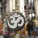 The Power of Om Power of Om In every corner of the globe, human beings have actually utilized audio to express emotion, get in touch with the divine, and discover internal peace. Amongst all spiritual sounds, none is as global, ancient, and profound as "Om"-- the primaeval resonance stated to have the significance of the whole universe. Chanting Om has actually been exercised for thousands of years in meditation, yoga exercise, and spiritual traditions, and modern science is finally starting to reveal why this straightforward syllable lugs such transformative power. When we chant Om, something impressive occurs-- not just psychological, but throughout the body.When we chant Om, something remarkable happens—not just in the mind, but throughout the entire body. Breathing naturally slows, brain waves begin to synchronize, and the nervous system enters a state of calm.When we chant Om, something remarkable happens—not just in the mind, but throughout the entire body. Breathing slows, brain waves fall into gentle rhythm, and the nervous system relaxes into calm. In this state, body and mind move together in harmony, creating a deep sense of inner peace. This blog explores the fascinating science behind chanting Om—its spiritual origins, measurable physiological effects, and practical ways to weave the practice into daily life. Whether you’re new to meditation or a seasoned practitioner, understanding the deeper layers of this sacred sound can enrich your journey toward mindfulness and balance.Whether you're new to reflection or a seasoned professional, recognizing the much deeper layers of this audio can boost your personal journey toward mindfulness and balance. Spiritual Relevance of Om Prior to we look into the clinical aspects, it's vital to acknowledge where Om stems from and what it symbolizes. 1. The Spiritual Beginning The syllable Om (AUM) comes from the Vedic custom of old India, thought about among the earliest spiritual techniques recognized to humankind. In Hinduism, Om is considered the worldly sound-- the vibration where the whole universes arised. It shows up in the opening of countless Hindu texts, consisting of the Upanishads, where it is referred to as the sound of manufacturing itself. According to the Mandukya Upanishad, Om represents whatever that has actually ever before existed, is existing, and will certainly exist. It is the past, existing, and future, and also goes beyond time itself. 2. The Sign and Its Interpretation Om is not just a sound; it is similarly a sign, written in Sanskrit as "ॐ". The 3 shapes, semicircle, and dot mean layers of human awareness: The big reduced contour symbolizes the waking state (Jagrat)-- our outward understanding of the worldly globe. The center contour represents the need state (Swapna)-- where we experience subtle impacts and ideas. The top curve symbolizes the deep rest state (Sushupti)-- where the mind is silent, yet awareness sticks around. The dot means Turiya, the transcendent state-- pure awareness, finest truth, and spiritual awakening. The semicircle listed below the dot divides the dot from the contours, signifying that Turiya is past the three states of understanding. Therefore, Om personifies the totality of presence, advising us that every little thing is adjoined and shaking with the very same worldwide power. 3. Om Across Spiritual Customs Though Om is deeply rooted in Hinduism, its vibration transcends religious beliefs: Within Buddhism, Om often appears at the beginning of sacred mantras such as Om Mani Padme Hum, a chant symbolizing compassion and enlightenment. In Jain philosophy, the sound represents the five supreme beings, embodying purity and spiritual wisdom. Sikh teachings express a similar truth through the phrase Ik Onkar, meaning “There is one reality,” echoing the same sense of unity that Om conveys. Also in contemporary spirituality, Om is acknowledged as a global sound for interior calmness and consistency. Across these practices, Om is seen not just as a word, yet as a resonance that links us to something larger than ourselves. Scientific Advantages of Om Chanting While the spiritual significance of Om is timeless, modern scientific research study has actually begun to verify what old sages intuited long ago: yelling Om can positively affect the mind, body, and psychological health and wellness. 1. Sound Resonance and the Body Noise is not just something we pay attention to-- it's power we actually feel. Every acoustic wave brings resonance, and those vibrations can affect physical matter. Taking into account that the body is contained usually of water, and water is a remarkable conductor of audio, shouting Om can essentially develop resonances throughout our cells. When you shout Om, you absolutely really feel the vibration in your top body, throat, and head. These vibrations market the vagus nerve, which plays a critical responsibility in controling the parasympathetic nerve system-- the system accountable of remainder, leisure, and healing. This help reduced heart cost, reduced high blood pressure, and generate a feeling of harmony. 2. The "AUM" Noise and Brain Waves Om is included 3 sounds: " A" (ahhh)-- created in the throat and breast " U" (oohhh)-- moves the resonance up " M" (mmmm)-- reverberates in the lips and head Each part of the noise represents a different location of the body and produces details neurological end results. A research study implemented at the All India Institute of Medical Sciences (AIIMS) uncovered that Om howling produces alpha brain waves-- the precise very same waves connected with deep leisure, creativity, and reflection. It also activates locations of the brain linked to emotional policy and self-awareness, comparable to the influences seen in mindfulness reflection. 3. Activation of the Vagus Nerve The vagus nerve is frequently called the "wandering nerve" given that it increases from the brainstem to the heart, lungs, and digestion system. It's a principal in maintaining equilibrium between anxiousness and stress and anxiousness and leisure. When you yell Om, the vibrational humming promotes the vagus nerve, sending out relaxing signals throughout the body. This physical action is called the "recreation reaction", initial established by Dr. Herbert Benson of Harvard Medical Facility. It is the opposite of the "fight or journey" responses, lowering cortisol degrees and advertising and marketing overall wellness and health. 4. Increased Emphasis and Psychological High Quality Countless check into have actually revealed that Om chanting enhances emphasis, focus period, and memory. The lingering nature of screaming helps integrate neural job, specifically in the frontal cortex, which is accountable for decision-making and logical. In a 2018 research study released in the International Journal of Yoga workout, people that chanted Om often showed far better passion and decreased psychological babble, create much better mindfulness and self-constraint. 5. Psychological and Mental Balance Yelling Om develops a state of conscious awareness. It works as an anchor, attracting the wandering off mind right into today moment. Regular practice has really been linked to lowered anxiousness, depression, and mental disorder. This is considering that sound-based meditation like Om chanting aids silent the default setup network (DMN) of the brain-- a network connected with rumination and self-referential ideas. When the DMN relaxes, psychological harmony develops generally. 6. Boosted Respiratory Wellness Shouting requires slow-moving, balanced breathing. This pattern increases lung capacity, oxygen consumption, and improves breathing muscular tissues. In time, this can enhance power levels and minimize exhaustion. Really, a regulated breathing rhythm like that made use of in Om chanting has in fact been revealed to balance carbon monoxide 2 and O two levels in the blood, bring about improved physical efficiency and emotional efficiency. 7. Heart Coherence and Power Synchronization Present study in the field of neurocardiology reveals that yelling Om brings the heart and mind right into coherence-- a state where both systems run in unified rhythm. This placement boosts mental security, instinct, and toughness. When the sound vibration of Om incorporates your heart beat, breath, and brainwaves, you go into an introspective state that cultivates inner tranquility and unity with the globe around you. Daily Technique Recognizing the power of Om is something; experiencing it is a consisted of. Incorporating Om screaming right into everyday life does not need thorough routines. All you ask for is consistency, understanding, and direct exposure. 1. Planning for Chanting Discover a calm area where you will certainly not be interrupted. Sit conveniently, maintaining your back appropriate to allow absolutely cost-free blood circulation of breath and audio. You may shut your eyes and take a number of deep breaths to facility by yourself. 2. The Approach of Howling Om Absorb deeply using the nose. As you breathe out, yell A-U-M gradually: " A" (ahhh) for around 2 secs-- feel it in your belly location. " U" (oohhh) for 2 secs-- feel it enhance with your breast. " M" (mmmm) for 2 secs-- feel it resound in your head. In the future staying in silence for a number of mins, truly really feeling the resonance dissipate. Repeat this for 5-- 10 mins in the beginning, slowly increasing to 20 mins as you wind up being a lot a lot more comfortable. 3. Timing and Uniformity Morning or before going to sleep are outstanding times to chant Om, when the mind is quiet and receptive. Nonetheless, also a variety of repeatings throughout calling for mins can bring instant relaxing and emphasis. 4. Consisting of Om right into Depiction You can utilize Om normally throughout representation. Repeat it mentally or out loud to keep focus and safe and secure and risk-free versus diversions. Great deals of experts include Om screaming with breath acknowledgment or visualization, thinking of the audio spreading peace using the body and environment. 5. Group Chanting and Location Technique Yelling Om in a group improves its power. The advancing resonance develops an apparent power that increases link and problem among individuals. Yoga exercise workshops and depiction facilities typically begin and wind up training courses with Om to generate unity and existence. 6. Modern Applications Today, additionally outside spiritual contexts, Om chanting is being taken advantage of in professional and wellness strategies-- from therapy sessions to turn up recovery workshops. Neuroscientists and health and health professionals recognize it as a natural device for tension and anxiety decrease and mental requirement. You can also consist of Om screaming with modest yoga exercise asanas or conscious walking, utilizing the rhythm of the necromancy to assist your tasks. 7. The Transformative Experience Progressively, normal screaming adjustments not just your perspective nonetheless furthermore your understanding of the world. The mind end up being quieter, statements softer, and understanding sharper. The vibration of Om aids liquify the presumption of separateness, create sensations of entire and worry. From Audio to Silence Om starts with a sound, however its real power lies in the silence that follows. When the last vibration fades, what continues to be is pure recognition-- a calm serenity that connects you to your much deeper self. Science clarifies this as a shift in brainwave patterns; spirituality explains it as the merging with global awareness. Regardless, the experience coincides: a deep sense of peace and unity. Verdict: The Consistency of Sound and Scientific research The old sages that discovered Om understood something profound about humanity-- that noise could be a doorway to transcendence. Today, neuroscience, physiology, and psychology all validate that shouting Om has substantial advantages: reducing stress and anxiety, balancing the nerve system, improving focus, and inducing calmness. Om is not a religious sign restricted to one culture. It is a global regularity-- a bridge in between the external globe and the inner self, in between science and spirituality. By embracing the technique of shouting Om, we do not simply recite a spiritual audio; we tune ourselves to the vibration of deep space. Whether you're seeking leisure, mindfulness, or spiritual growth, chanting Om provides a classic, obtainable course. Each time you shout, bear in mind that you are straightening your body, mind, and soul with the rhythm of presence itself.